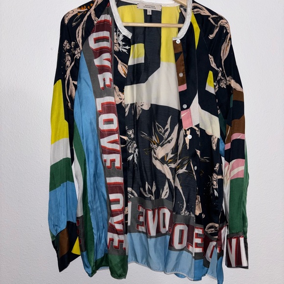 DOROTHEE SCHUMACHER
Artistic Patch Silk Blouse
$610 size 3 - Picture 5 of 8